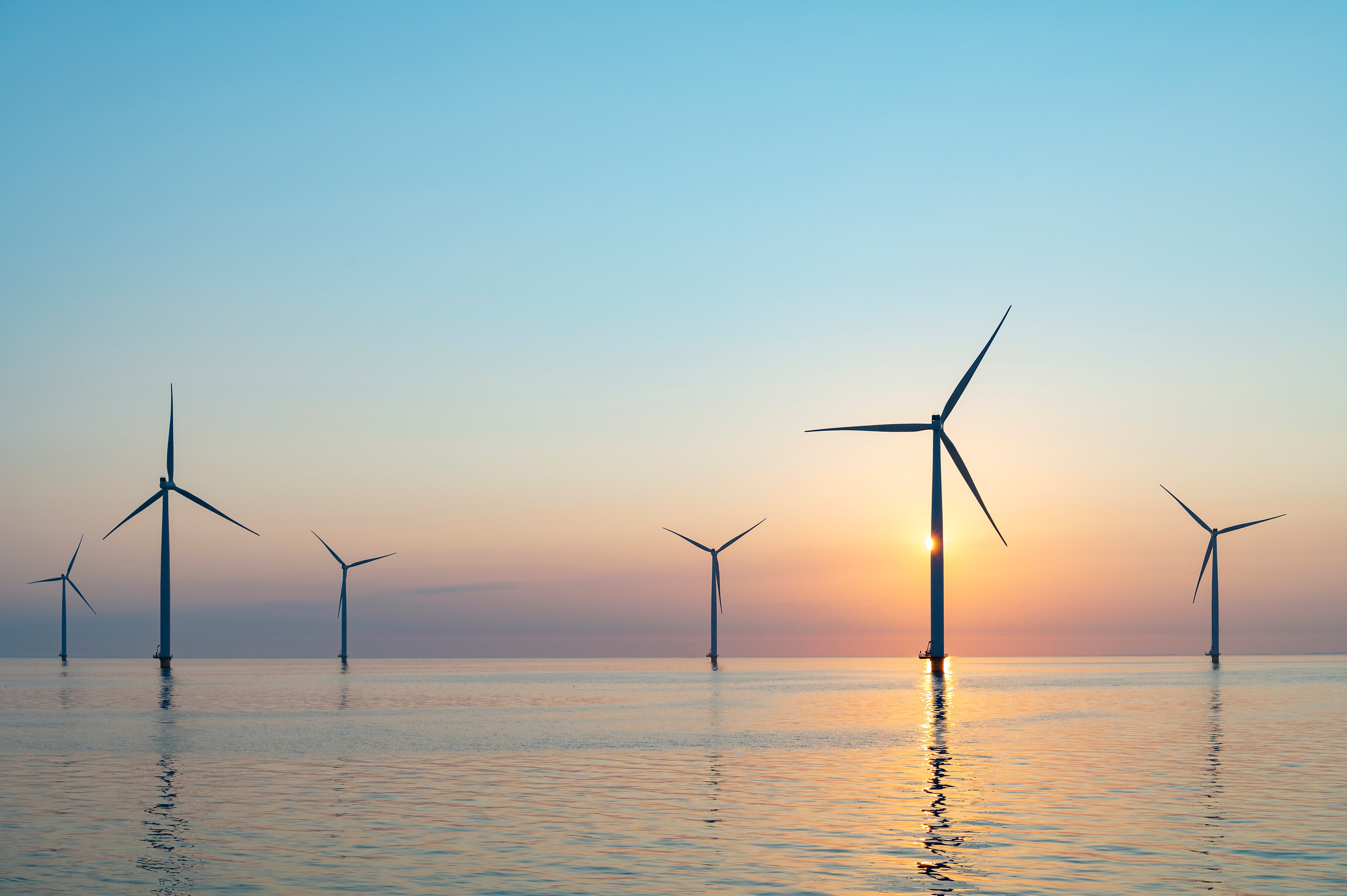 sea and sky scene with wind turbines